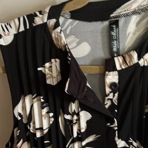 Long Sleeveless top. Size large. Would go well Leggings